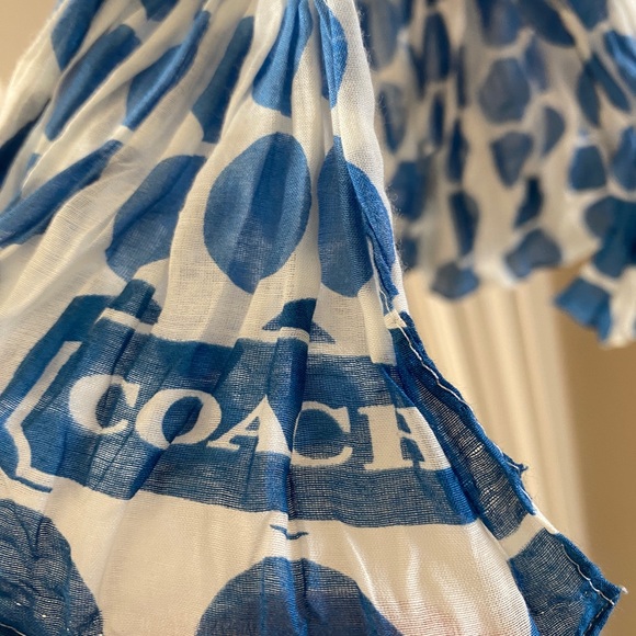 Coach Waverly Dots Oblong Wrap Scarf
Poppy Pastel - Picture 7 of 7